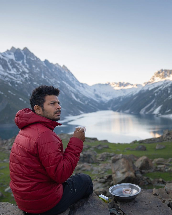 Ashik on a Kashmir ridge in his red jacket
